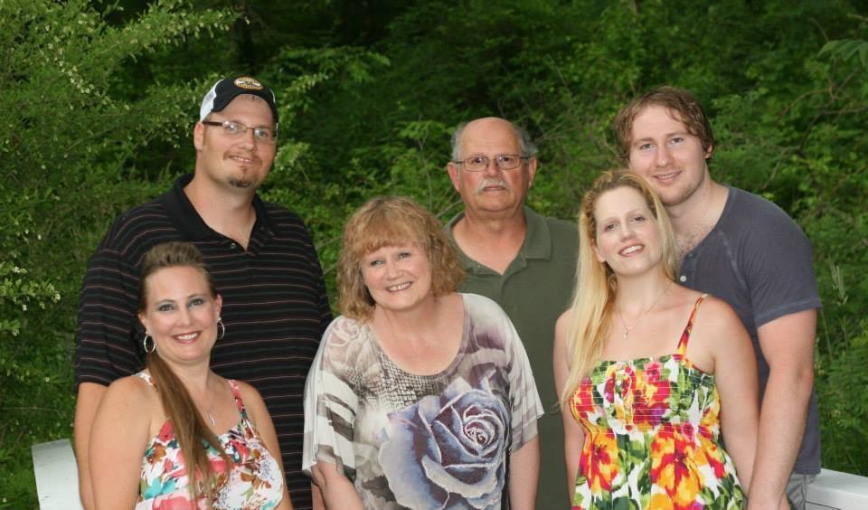 This was us during the family vacation in Saugatuk, MI in 2013. It was a fun time at the beach and the sand dunes!