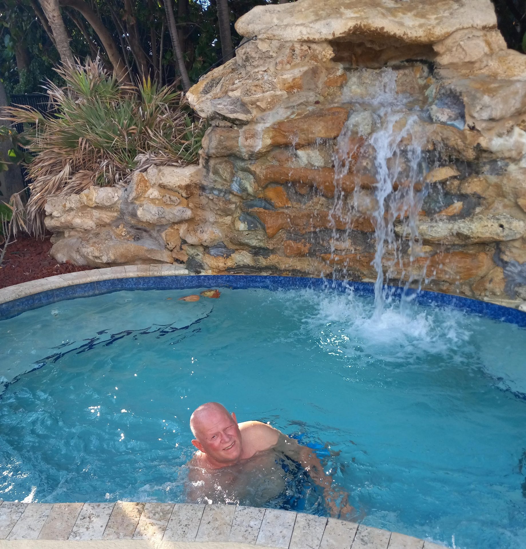 Don enjoying hot tub Jensen Beach trip.