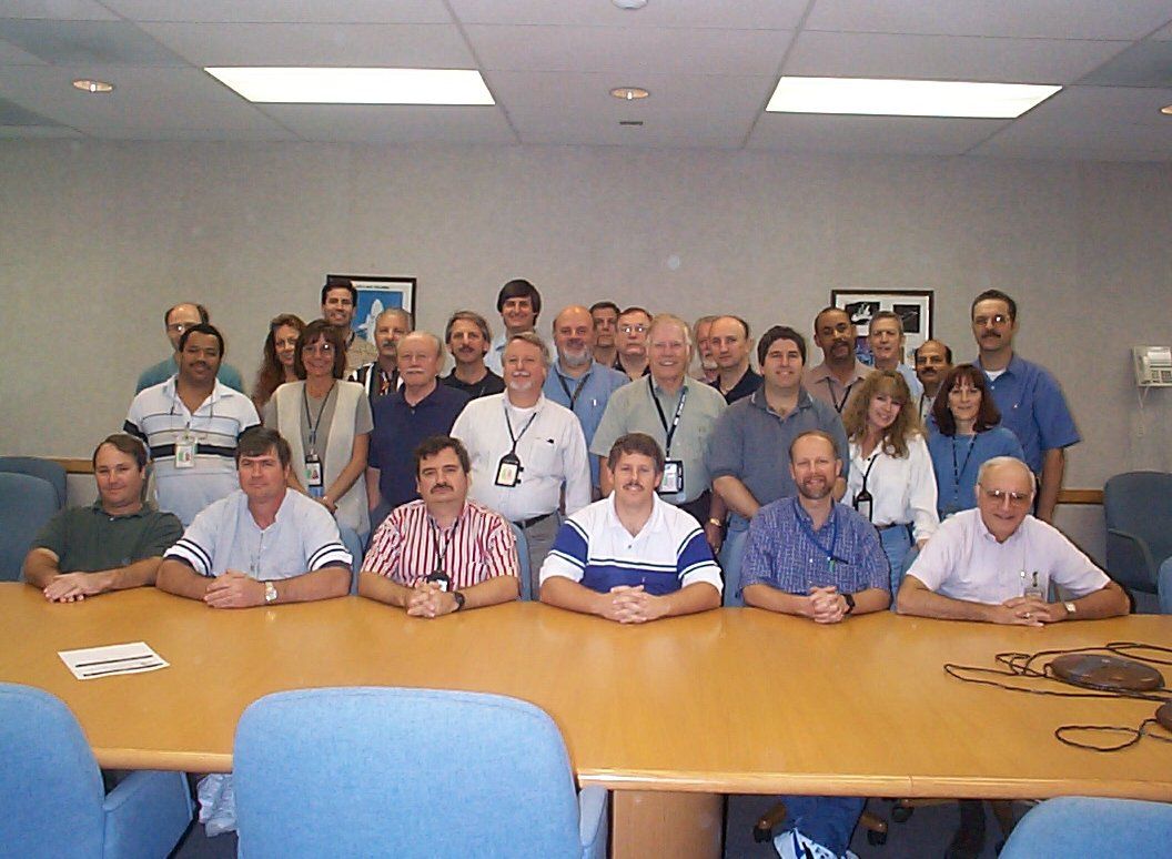 Chris with the work gang in the Titusville offsite design building off of SR 405 and 407.  This may have been in the mid 1990s or so as we were in that building twice.