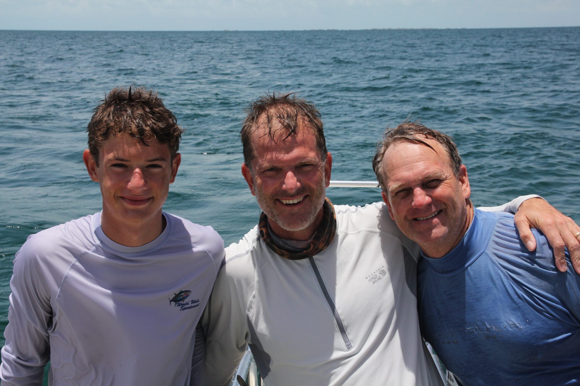 Zach, Mike Bundy and Jonathan in Grand Cay.