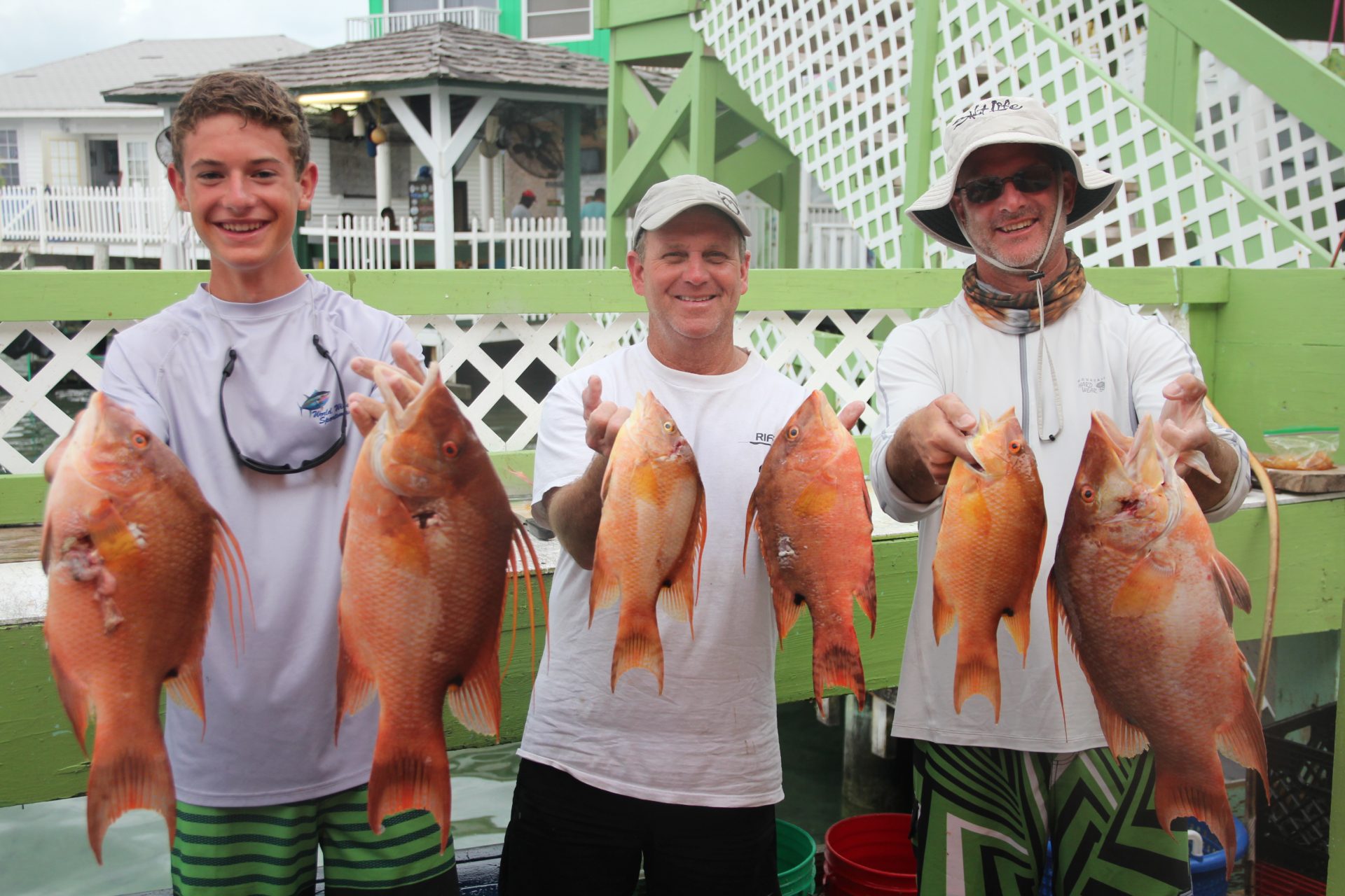 Zach, Mike Bundy and Jonathan in Grand Cay with some rather small hogs, especially yours Mike.