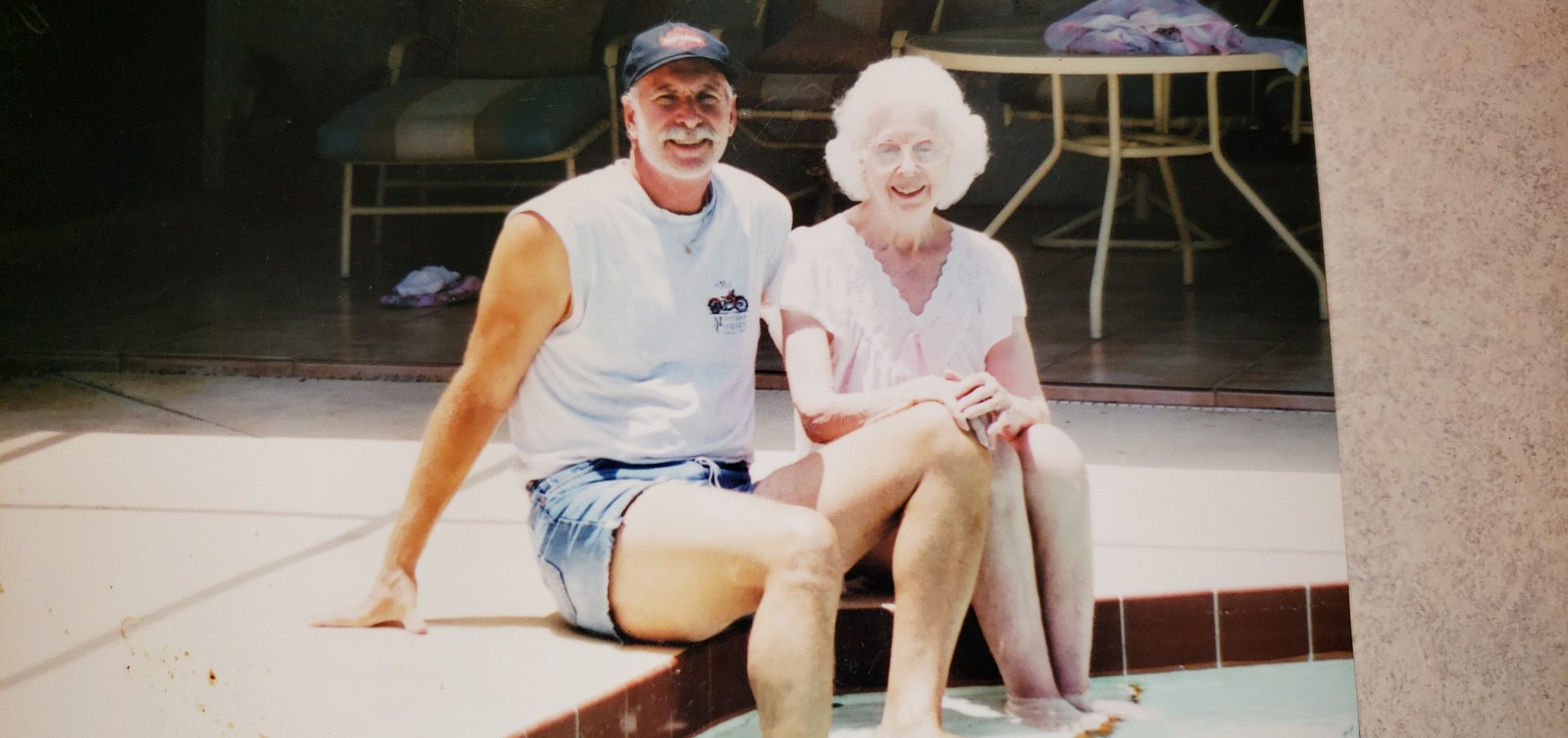 Ken and our mom by the pool in Apopka.