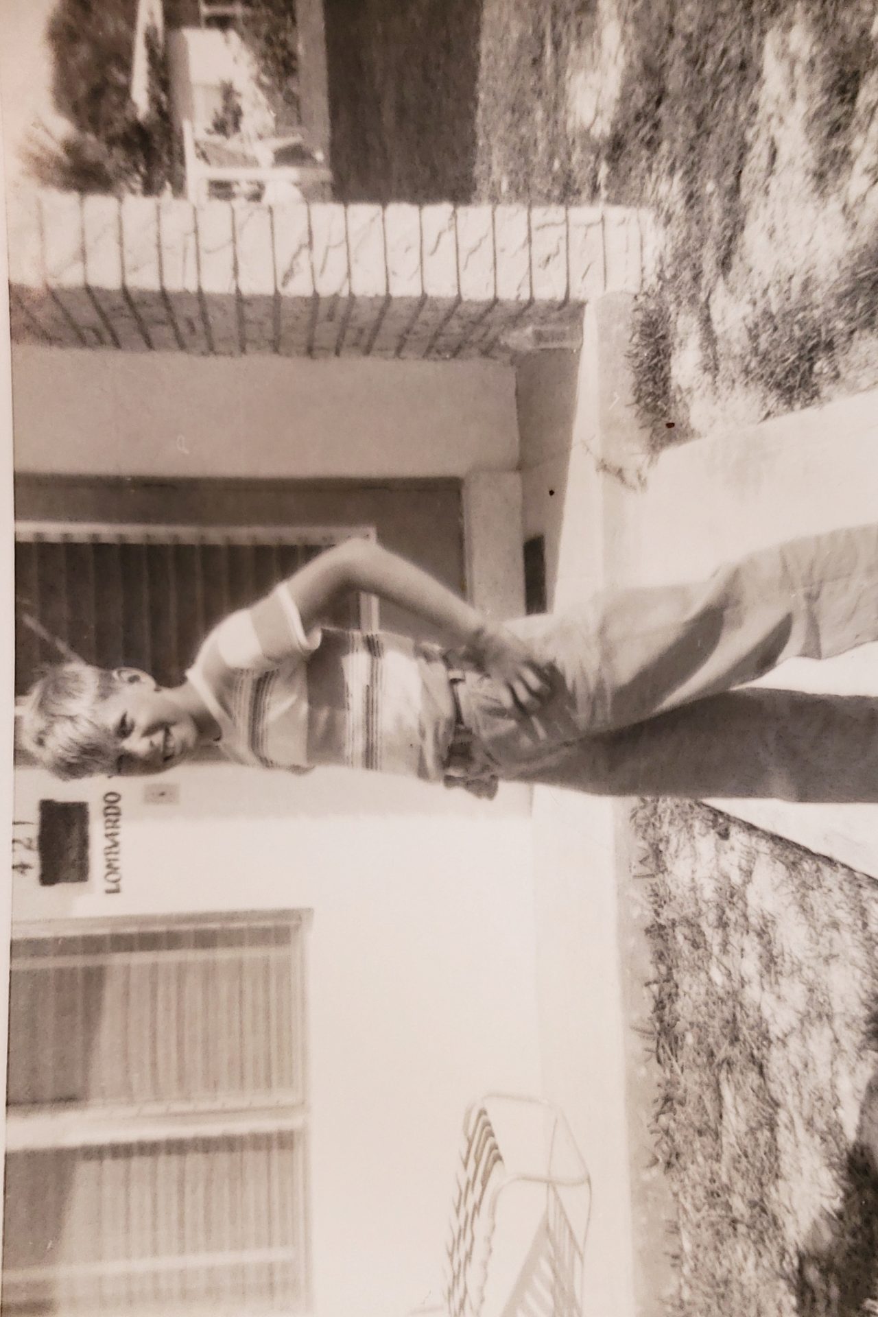 Ken at around 10 or 11 in front of Miami house.