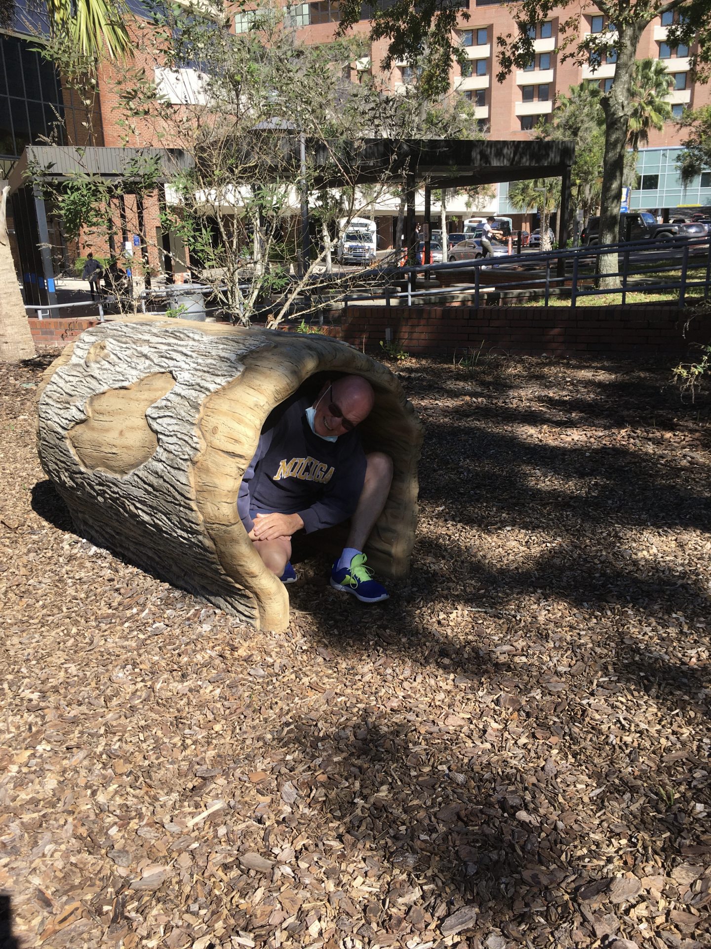 Russ spent a week at Shands for evaluation of double lung transplant,  but even so couldn’t resist getting inside this playground log there, like the cute Chipmunk that he was!