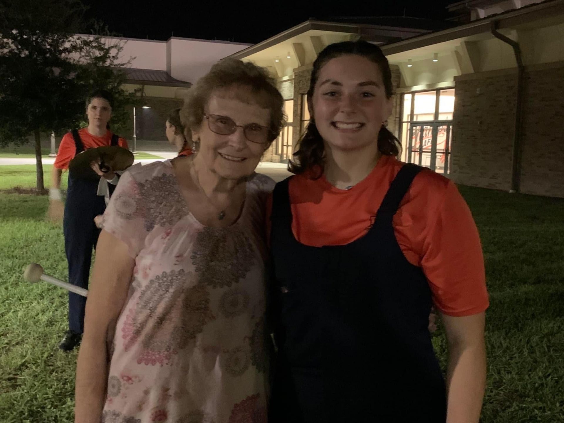 My grandmother and I after my last marching band performance of high school