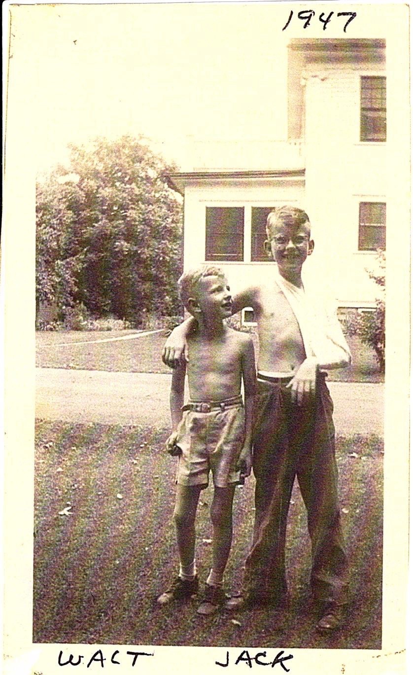 Walt looking up to his older brother John.  My Mom had this photo :) Many condolences from Eric and Terry