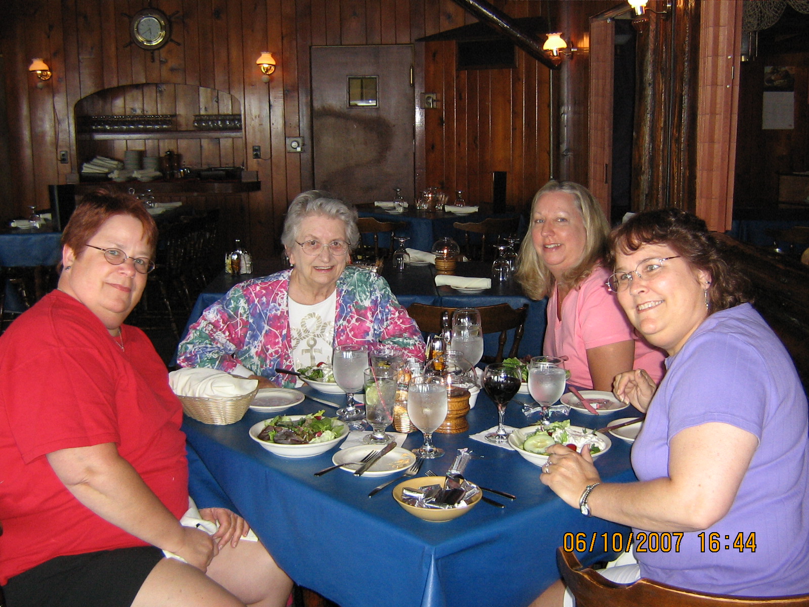 Trish, Mary, and Peggy with my mom (their Aunt Jan) in 2007, I believe at the Captain's Cabin on Crooked Lake.