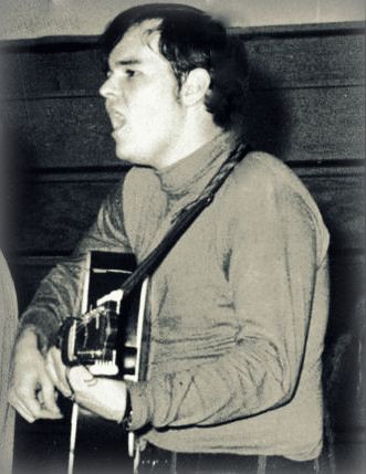 A cropped version of the group photo, isolating Mike performing. I used this image for my phone contact list and email, and brings a smile every time I see it.