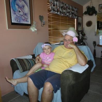 Uncle John loved being silly!  Here he is wearing Tatum’s hat  On a girls trip we took in 2012.