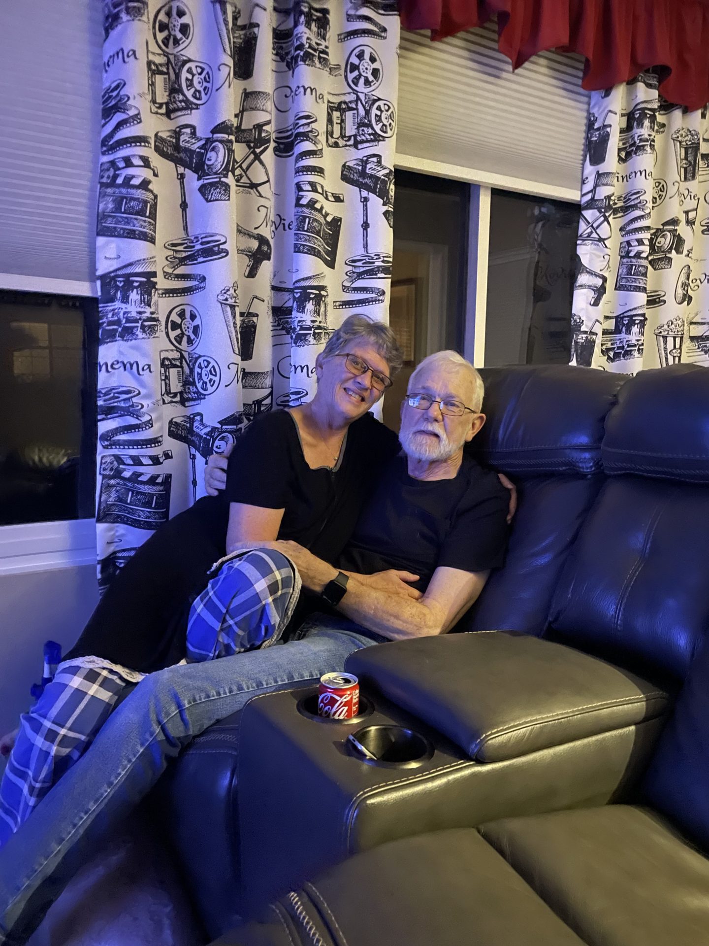 Vicki and Don in their Movie room waiting for the  to be popped!!!