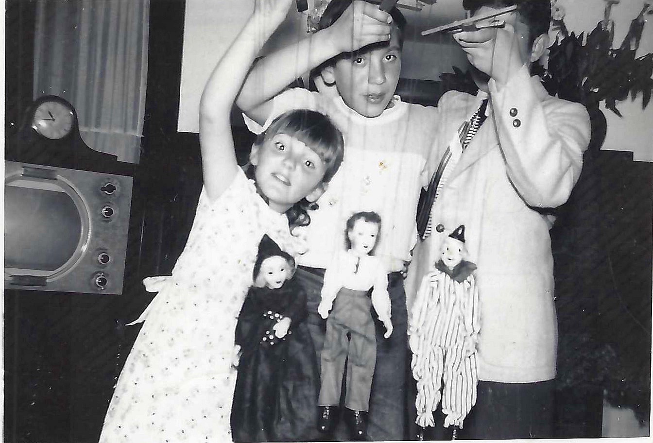 Jimmy and Judy performing with marionette puppets (Jack, Bimbo the Clown and the Witch).