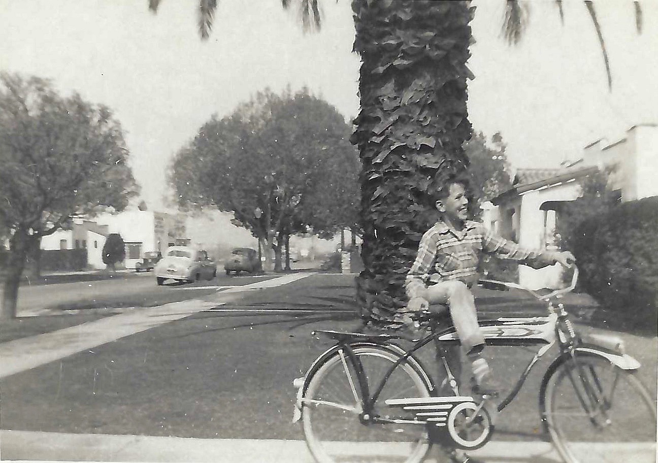 Jimmy in Montrose California with new Western Flyer bike he won from delivering newspapers.