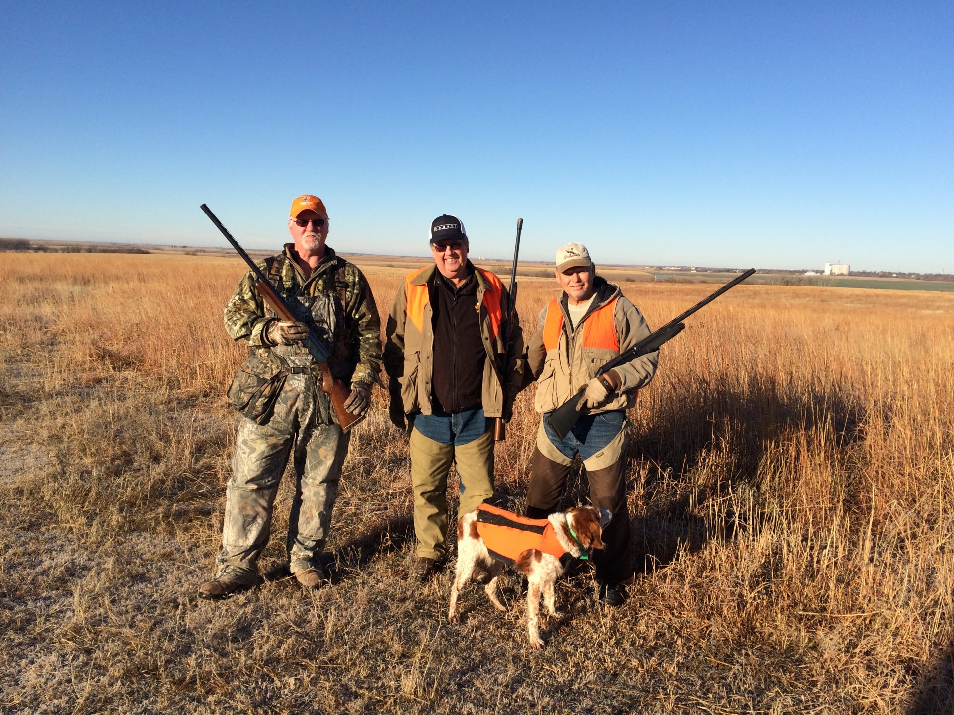 The beautiful fields of Kansas with his best hunting dog Mollie. We shared some fun times there!