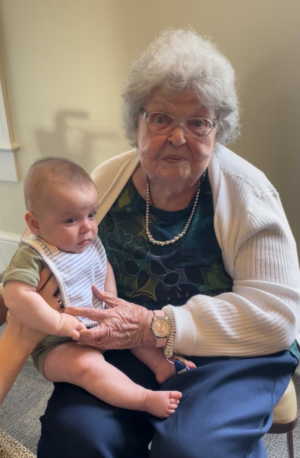 Oldest member meeting the youngest member of the family