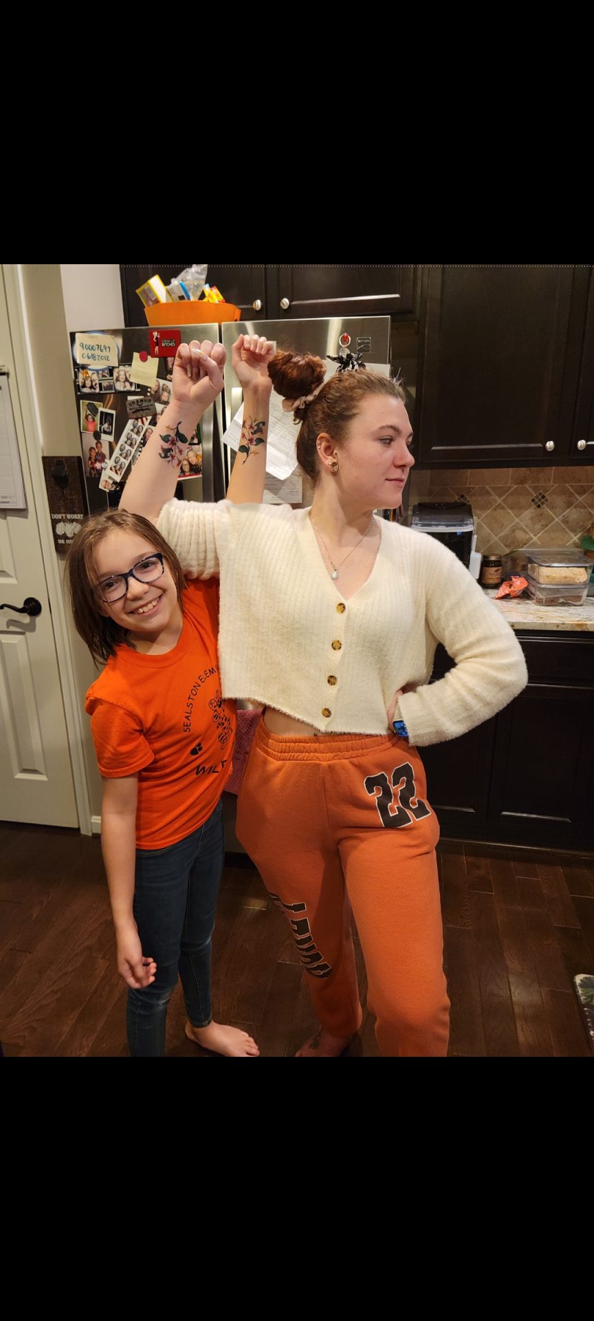 Allison with my daughter loving their tattoos!