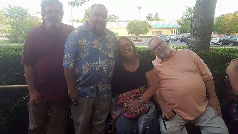 Siblings outside McGuirres Irish Pub