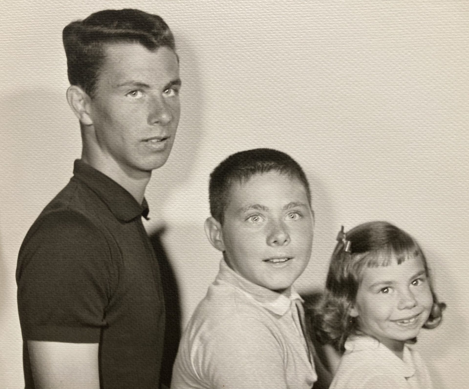 Arnold with brother Mark and sister Jill