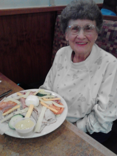 Oct 2011: Grandma Dawson eating one of her favorite things, a big salad with chicken and honey mustard dressing!