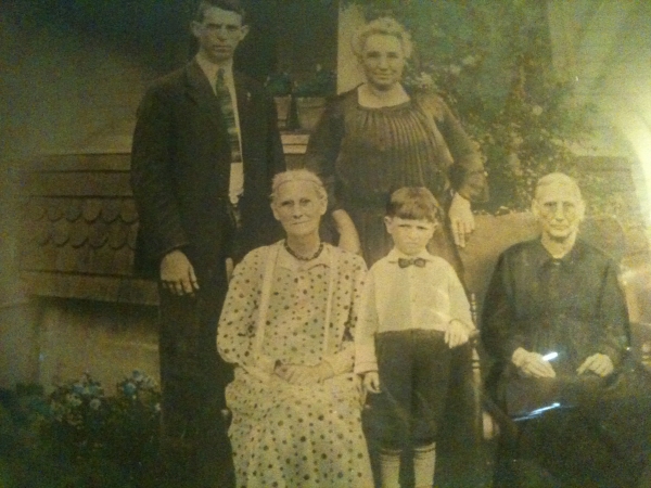 The little boy is Boyd, Tall man is Lyman Shreve, the rest are Boyd's grandparents  and a great grandparent.