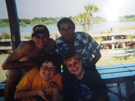 This was him with his three sons. I a mthe youngeest. This was right after my birthday and he took us fishing.